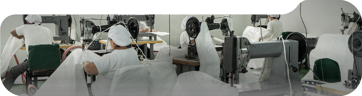 Operators sewing Big Bags on industrial machines