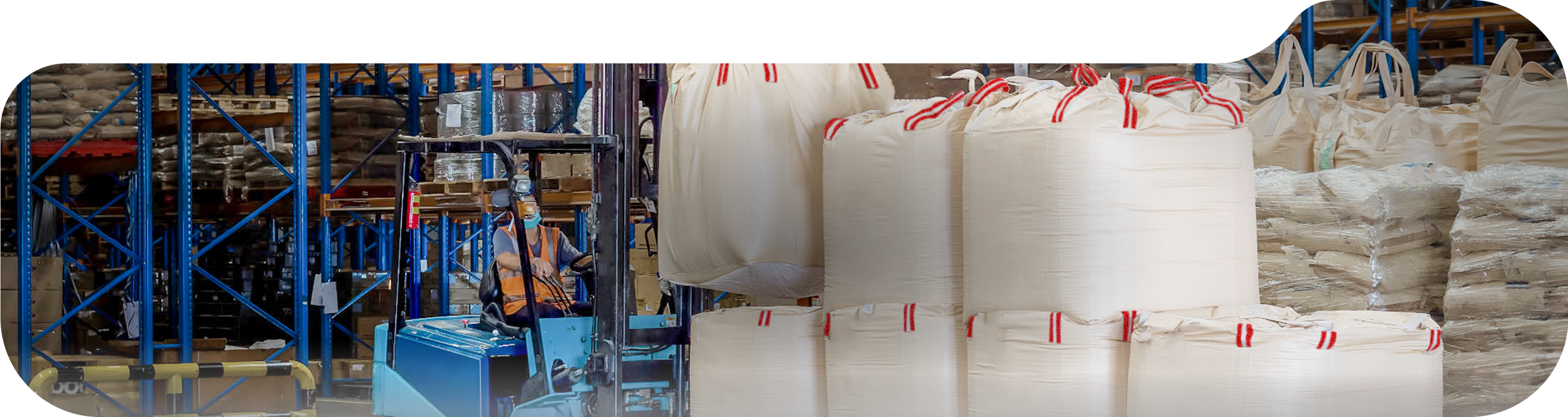 NEGASAC Big Bags in a warehouse with racks and forklift